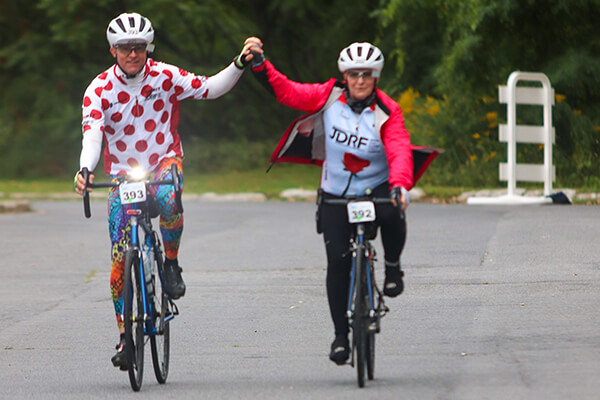 Dick and Julie approaching the finish line together at the 2017 JDRF Ride in Saratoga Springs, NY